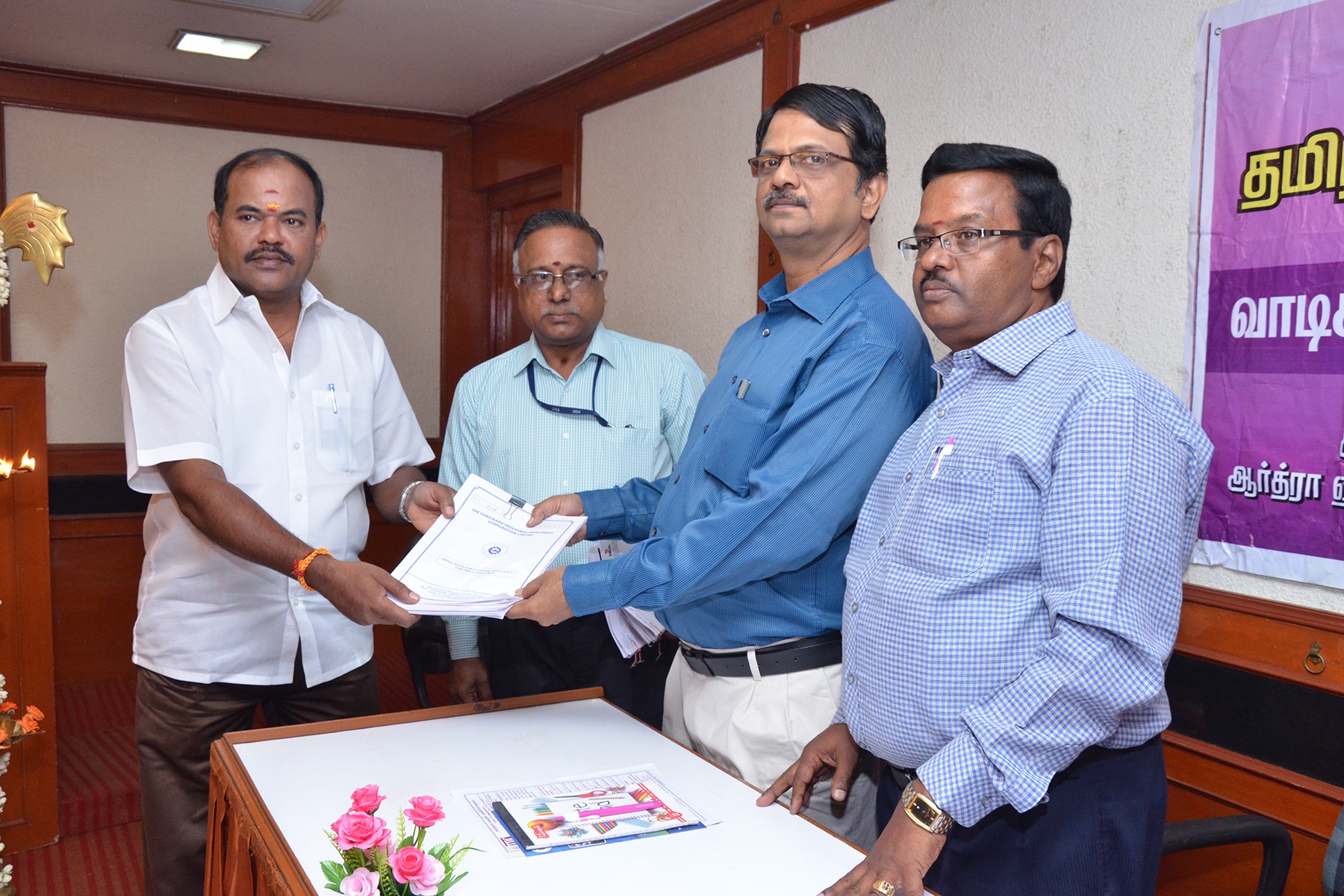 Mr.Kirubakaran R, GM-I, issuing application to a Customer during our Special Business Campaign at Erode Branch Office - 